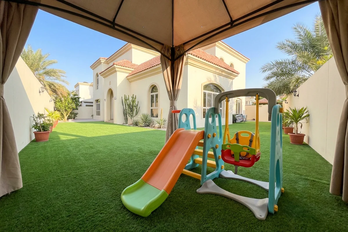 Artificial grass kids play area in a Dubai villa garden